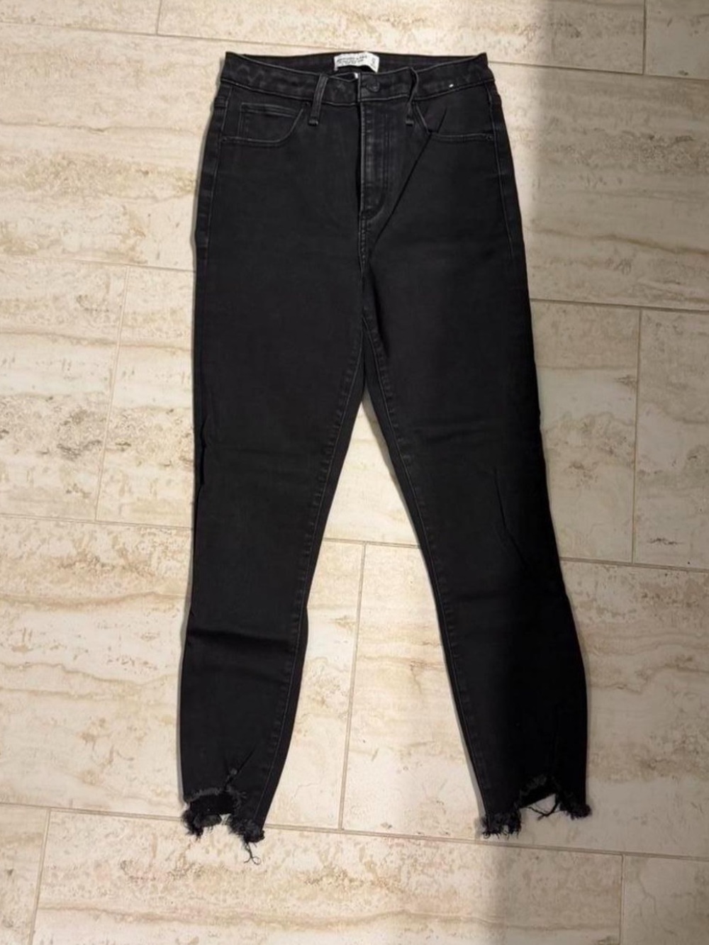 High-Rise Black Skinny Jeans with Raw Hem